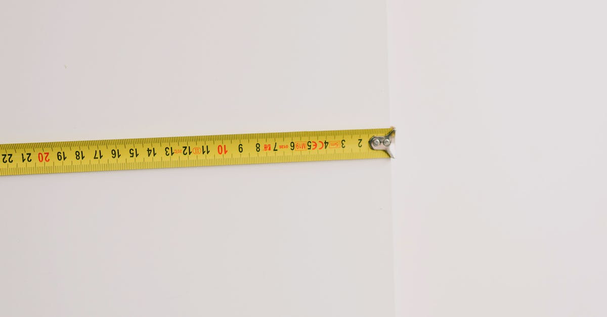 How do I build a house for my NPCs? - Measuring tape on empty white background How do I build a house for my NPCs? - Measuring tape on empty white background