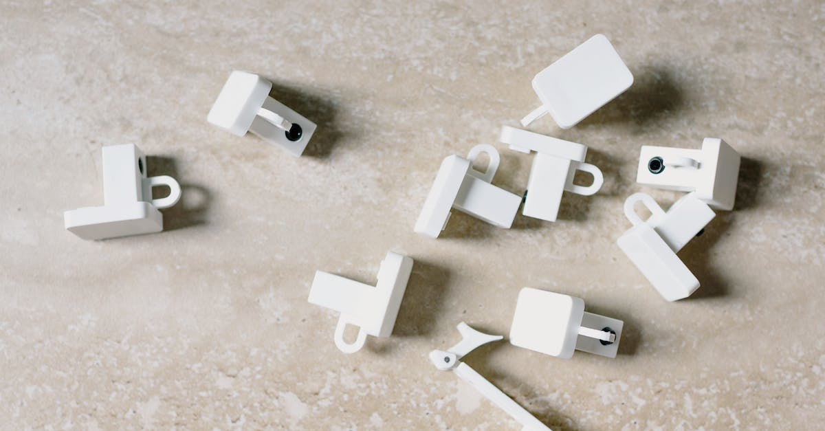 How do I build a house for my NPCs? - From above of different plastic tools for repairing works on marble surface at home How do I build a house for my NPCs? - From above of different plastic tools for repairing works on marble surface at home