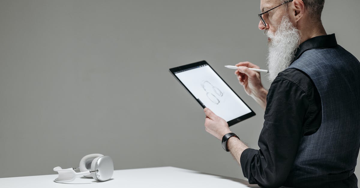 How do I carry my Draw Something contacts from my old iPad to my new iPad? - A Bearded Businessman Drawing on a Tablet with a Stylus How do I carry my Draw Something contacts from my old iPad to my new iPad? - A Bearded Businessman Drawing on a Tablet with a Stylus