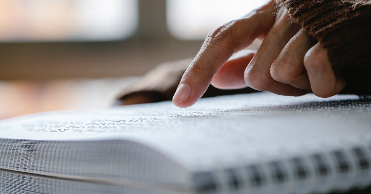 How do I change characters on The Binding of Isaac? - Photo of Person Pointing on Braille How do I change characters on The Binding of Isaac? - Photo of Person Pointing on Braille