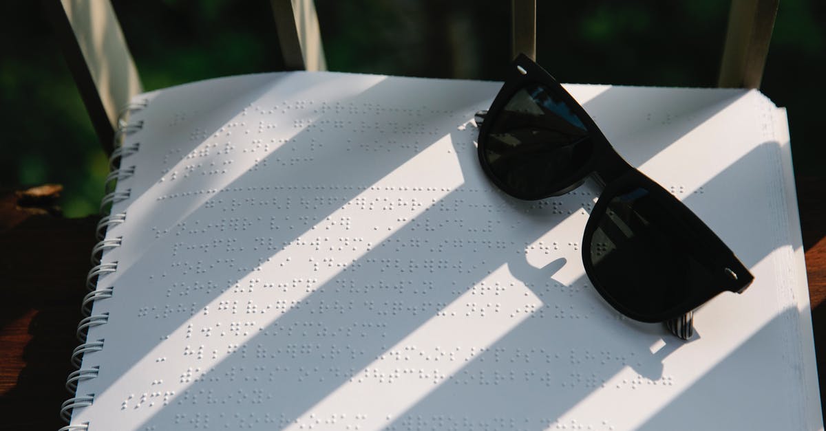 How do I change characters on The Binding of Isaac? - Photo of Black Sunglasses on Top of Braille How do I change characters on The Binding of Isaac? - Photo of Black Sunglasses on Top of Braille