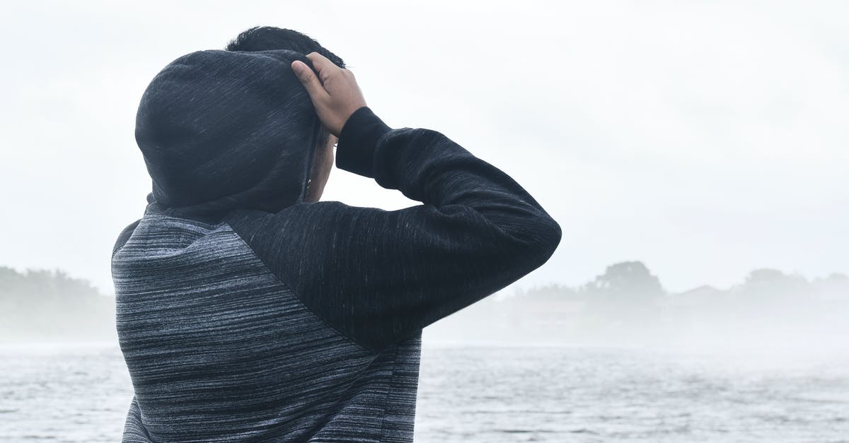 How do I change cloud nine back to mr.cuddles? - Person in Black and Grey Raglan Hoodie Near Body of Water How do I change cloud nine back to mr.cuddles? - Person in Black and Grey Raglan Hoodie Near Body of Water