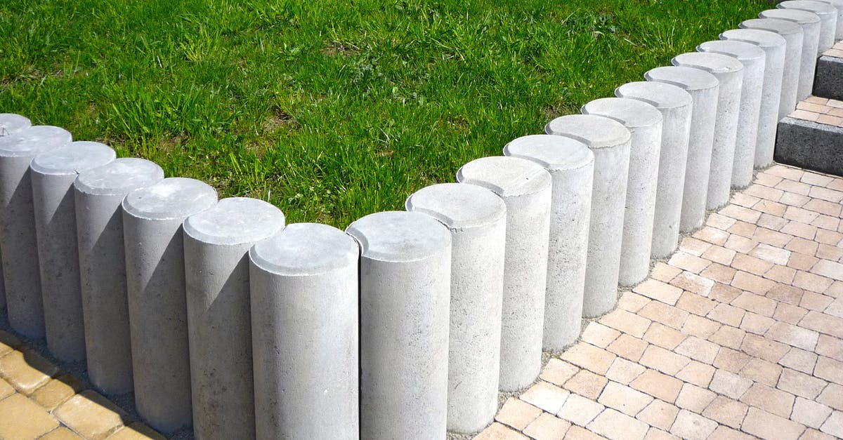 How do I change grass blocks within a set region to magma blocks? [duplicate] - Gray Concrete Bollards