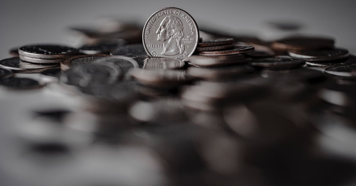 How do I change my skin? - Silver Round Coins on Brown Wooden Surface