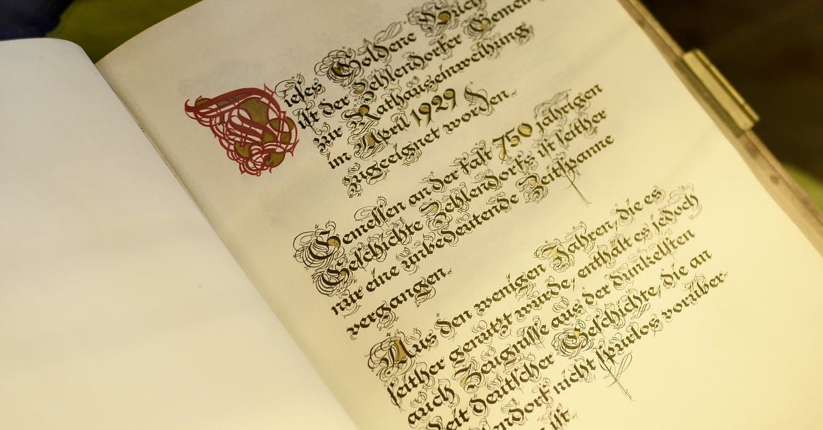 How do I change the language of the German version of Fallout 3 to English? - Old opened book with calligraphic inscription