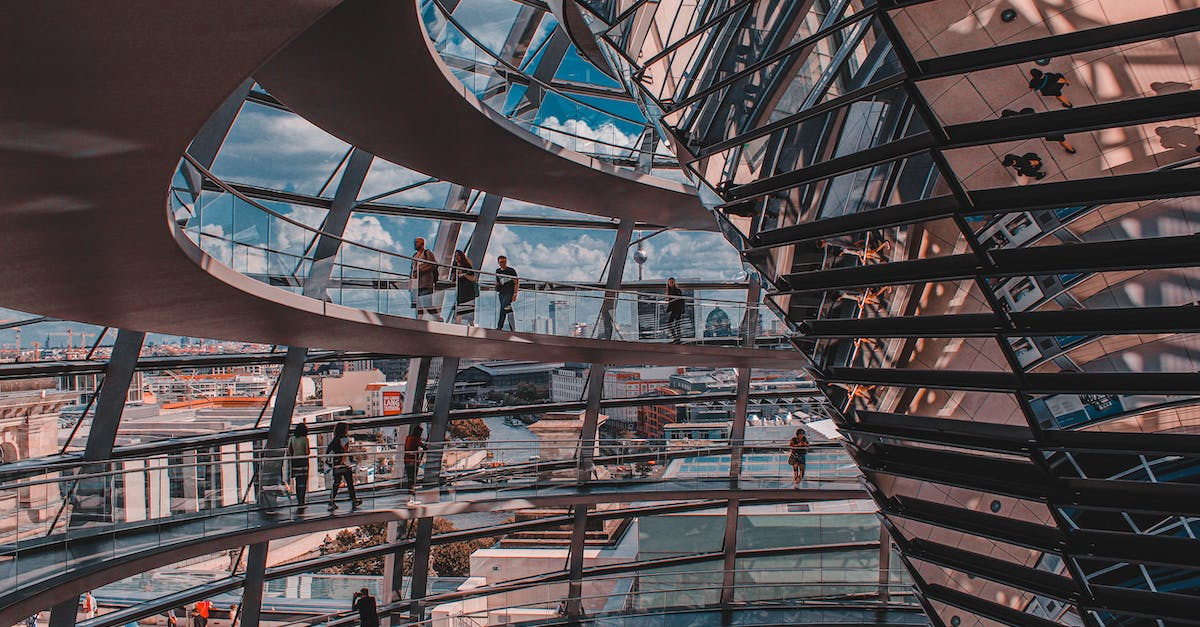 How do I check my level password in Geometry Dash? - People walking on paths inside modern building