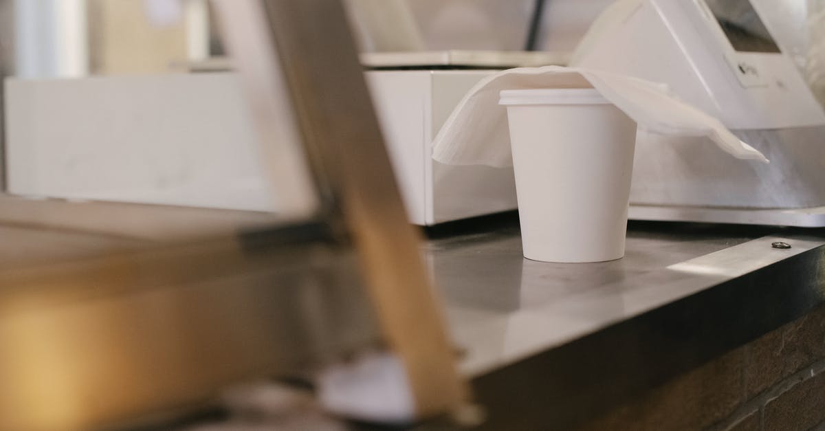 How do I check where to go next? - Paper cup of coffee on counter