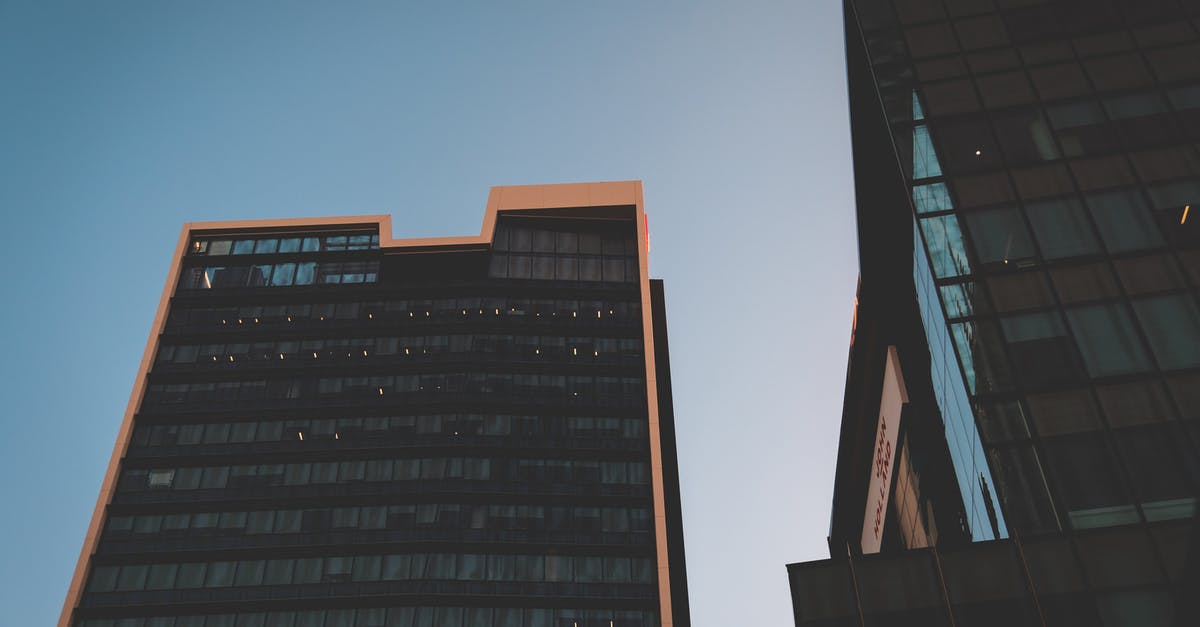 How do I clear my progress on Clash Royale? - Modern tall business centers with glass facades