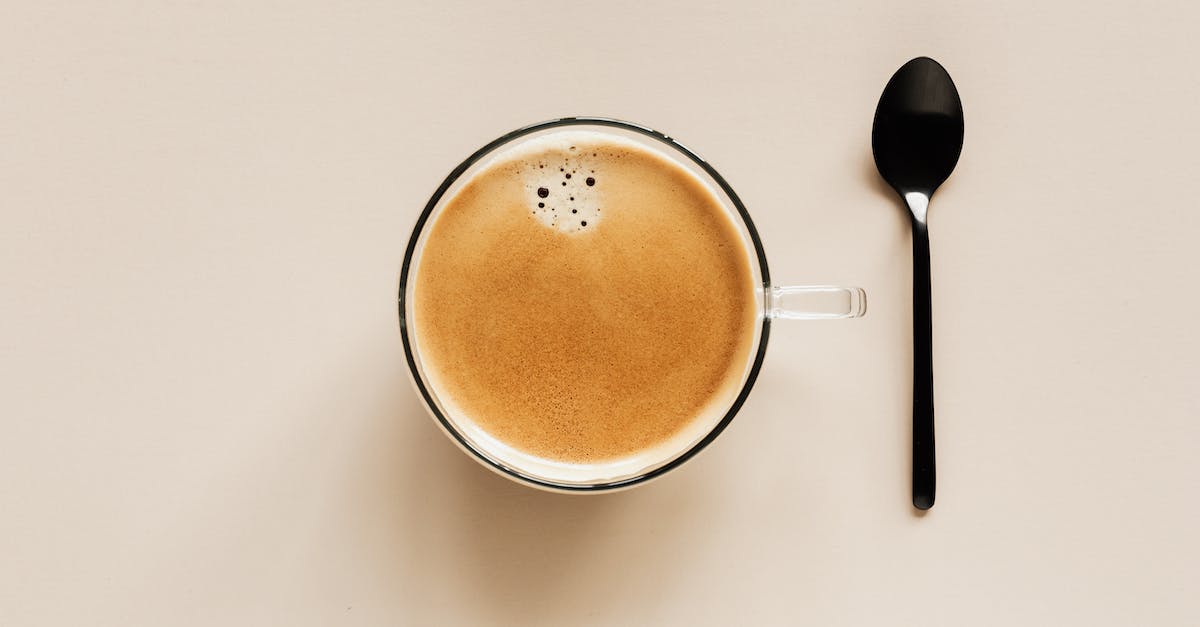 How do I complete the 2nd portion of the raid on Vay Hek? - From above of clear glass cup with hot aromatic drink placed near black metal spoon on beige table for coffee break