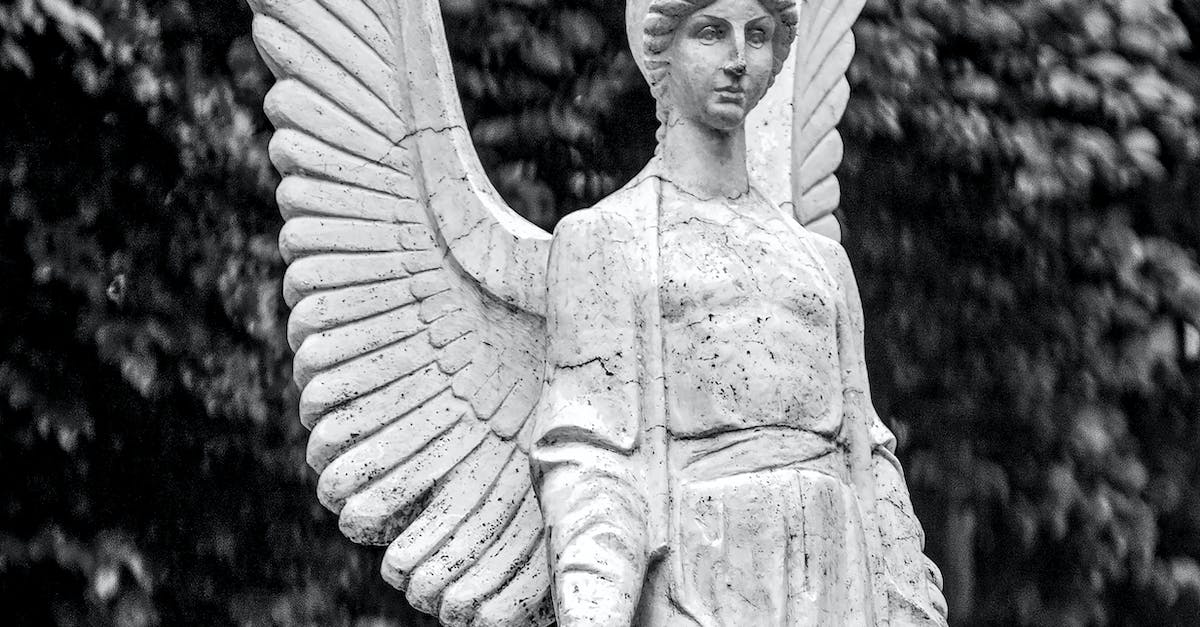 How do I complete the statue puzzle? - Angel Statue in Grayscale Photography