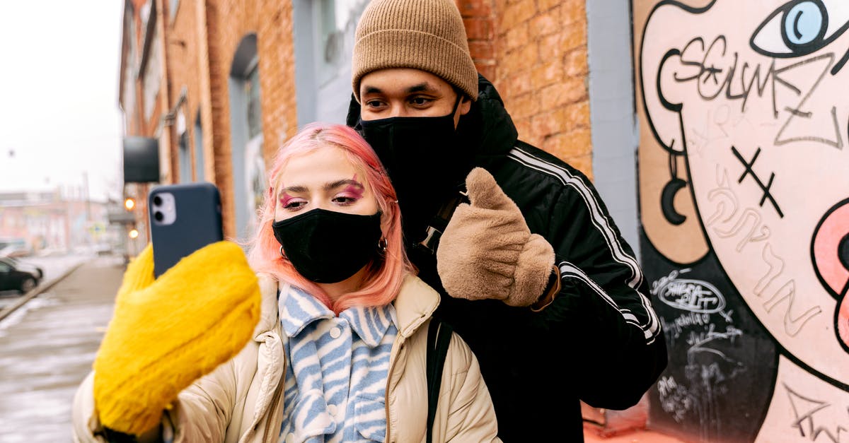 How do I complete the Taking Independence quest? - Couple in Face Masks Taking Selfie Outdoors