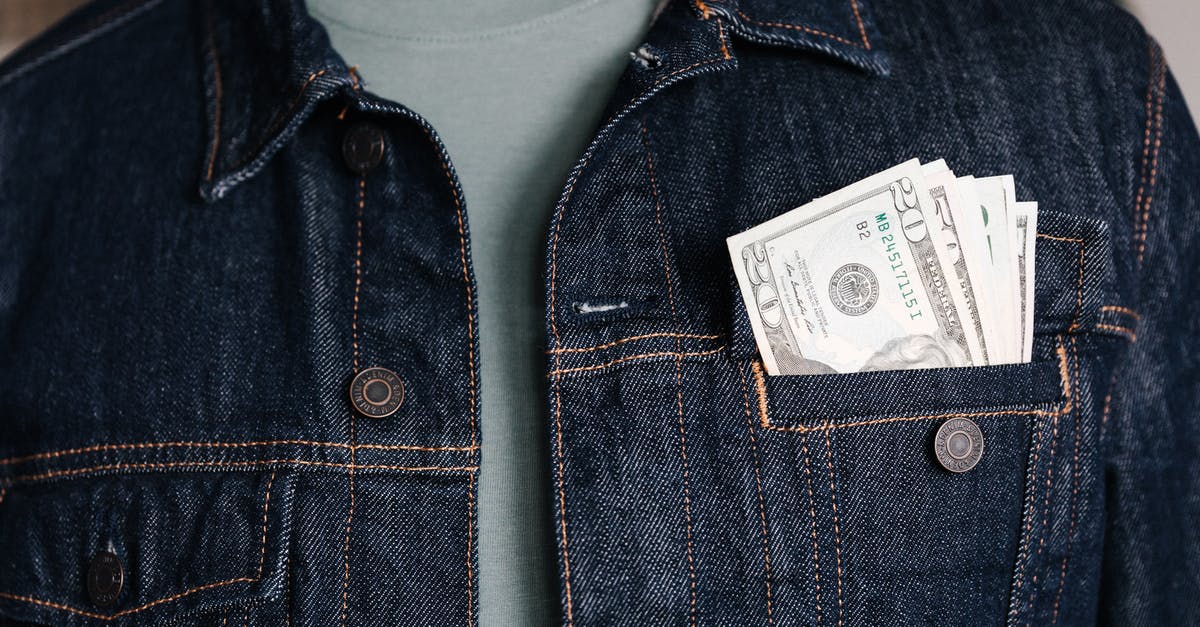 How do I completely close Minecraft pocket edition? - Crop unrecognizable male in casual outfit standing with different nominal pars of dollar banknotes in pocket of jeans jacket How do I completely close Minecraft pocket edition? - Crop unrecognizable male in casual outfit standing with different nominal pars of dollar banknotes in pocket of jeans jacket