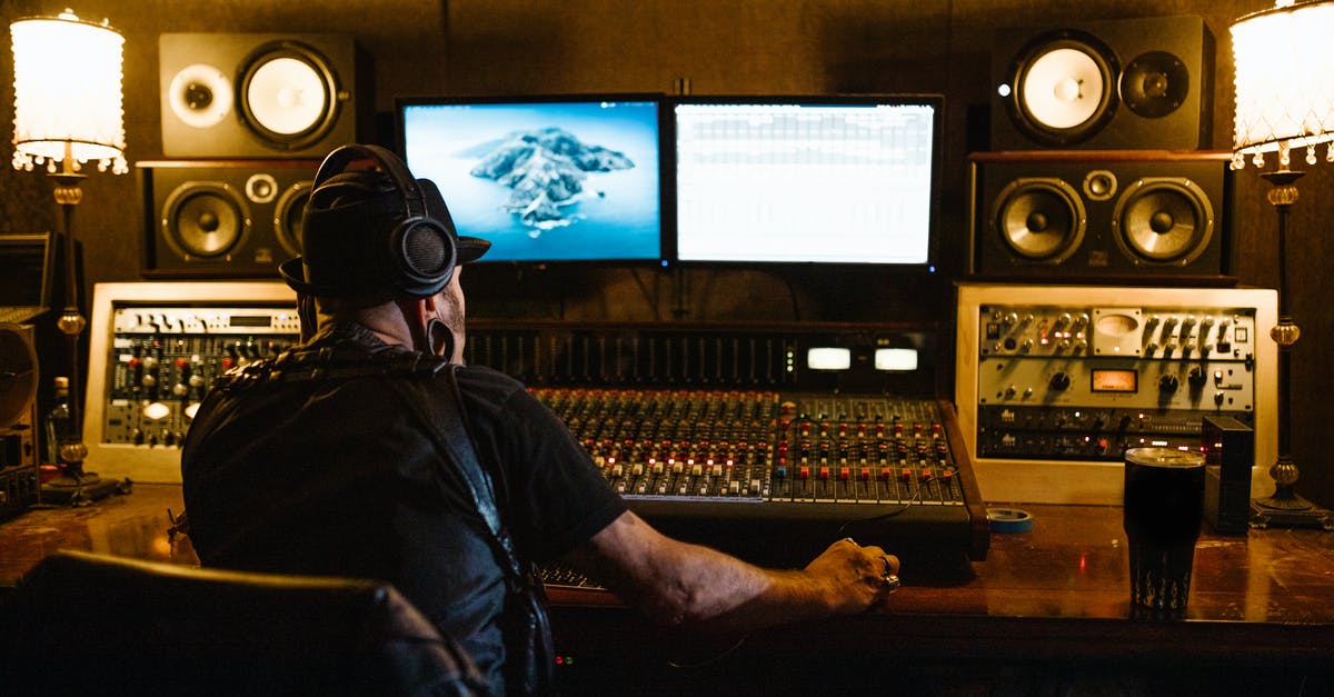 How do I control Nana? - Man in Black Shirt Wearing Headphones in Front of Monitors How do I control Nana? - Man in Black Shirt Wearing Headphones in Front of Monitors