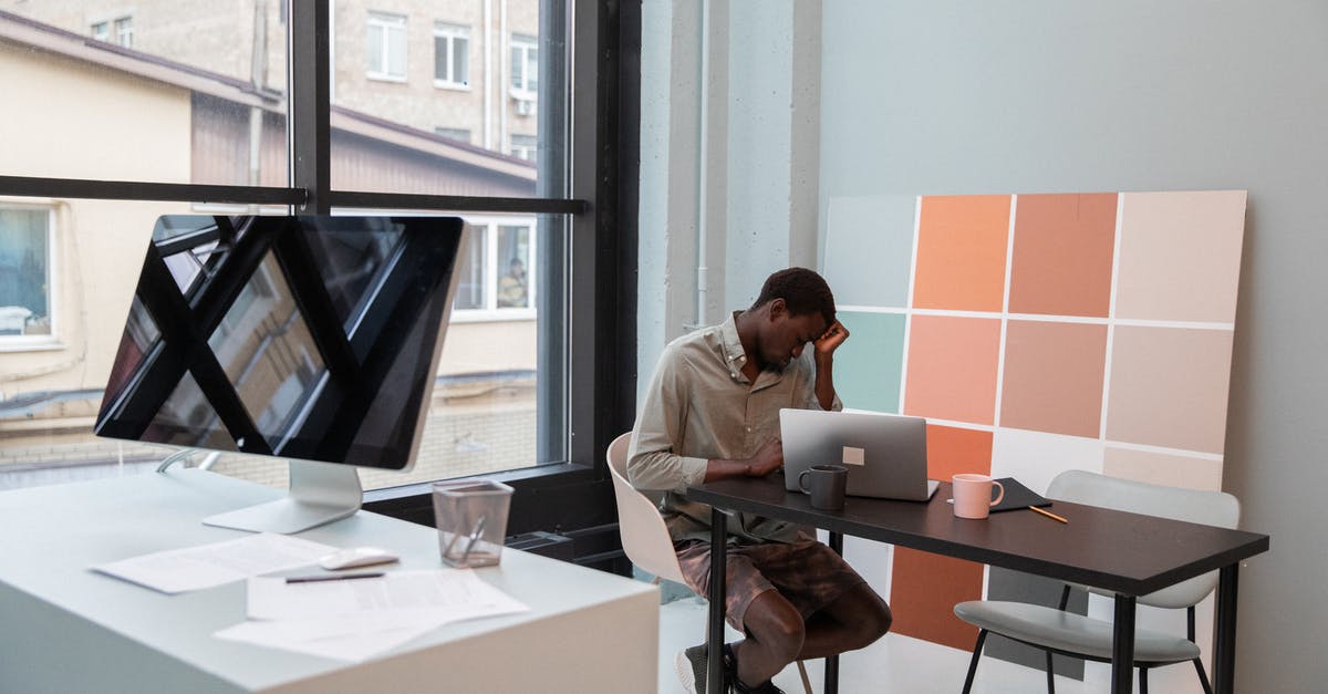 How do I copy heads on minecraft on a windows 10 laptop? - Tired black businessman in modern office