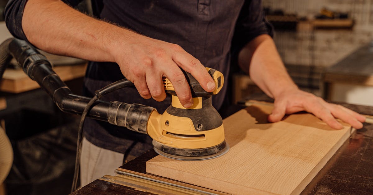 How do I craft better Tools in 7 Days to Die? - Man in Black T-shirt Holding Black and Yellow Cordless Power Drill