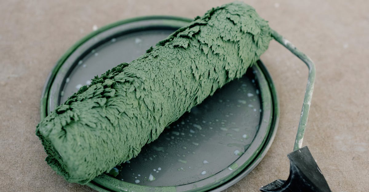 How do I create unbreakable blocks? - High angle of wet dirty roller for painting on plastic cap from paint on floor How do I create unbreakable blocks? - High angle of wet dirty roller for painting on plastic cap from paint on floor