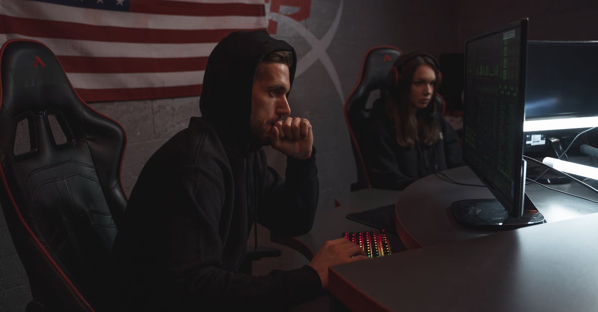 How do I deploy gadgets during a glide attack? - Two People Sitting on Chairs Using Computers