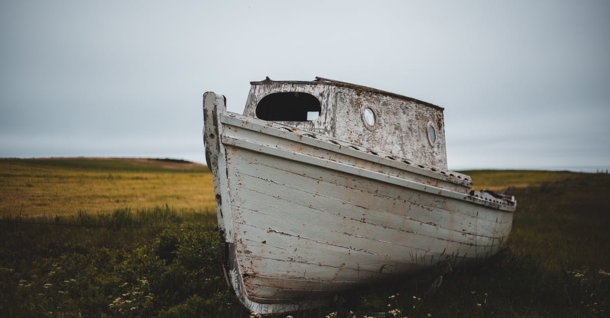How do I destroy a ship realm in the Archimedes' Ships mod? - Old boat on grassy field in overcast How do I destroy a ship realm in the Archimedes' Ships mod? - Old boat on grassy field in overcast