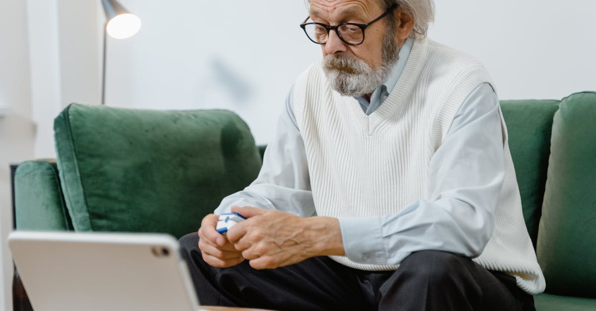 How do I diagnose as a Doctor? - An Elderly Man Sitting in a Couch Holding a Pulse Oximeter How do I diagnose as a Doctor? - An Elderly Man Sitting in a Couch Holding a Pulse Oximeter