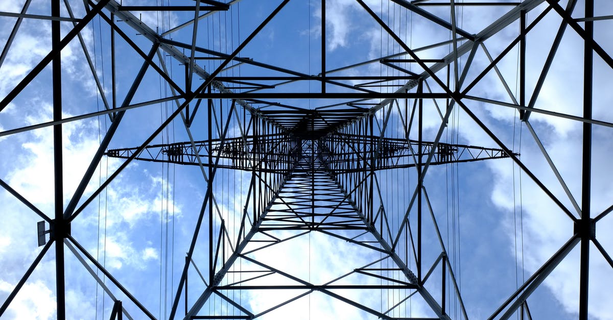 How do I disable the power grid in the Seoul Power Plant? - Low Angle Photograph of Black Metal Tower Satellite during Daytime