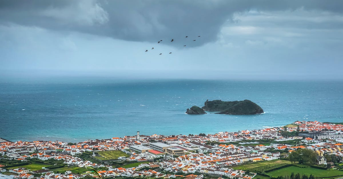 How do I do The Hole and the Ocean on iOS with no keyboard? - Aerial Photography of Village Near Body of Water How do I do The Hole and the Ocean on iOS with no keyboard? - Aerial Photography of Village Near Body of Water