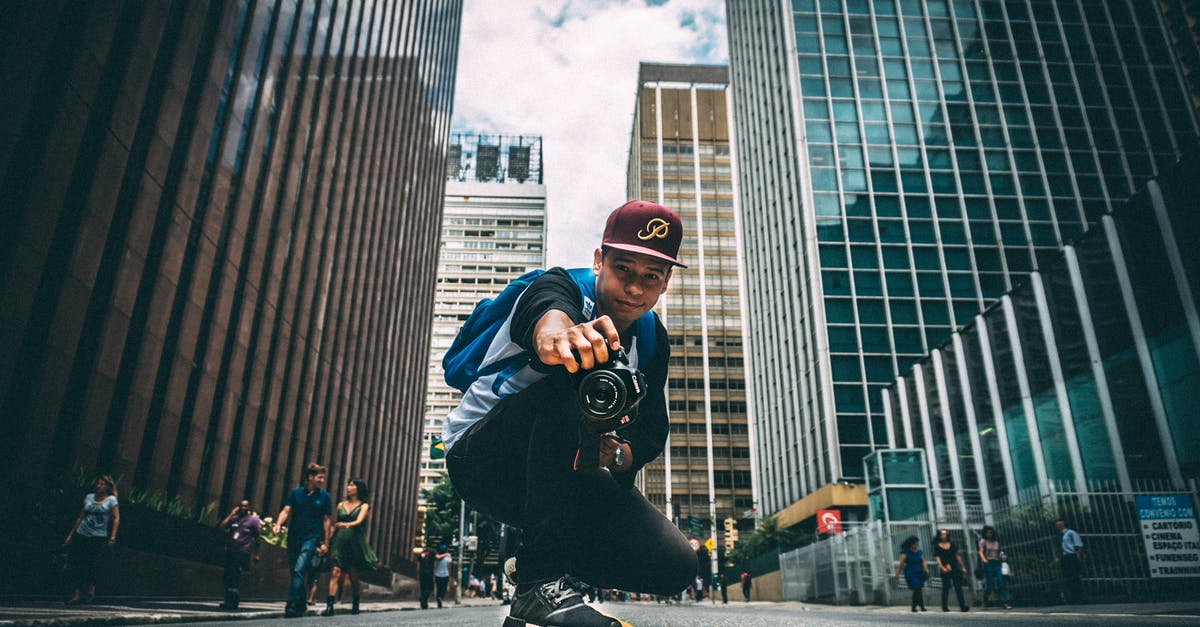 How do I end the forced camera angle when the monster is successfully hunted? - Portrait of Man on City Street