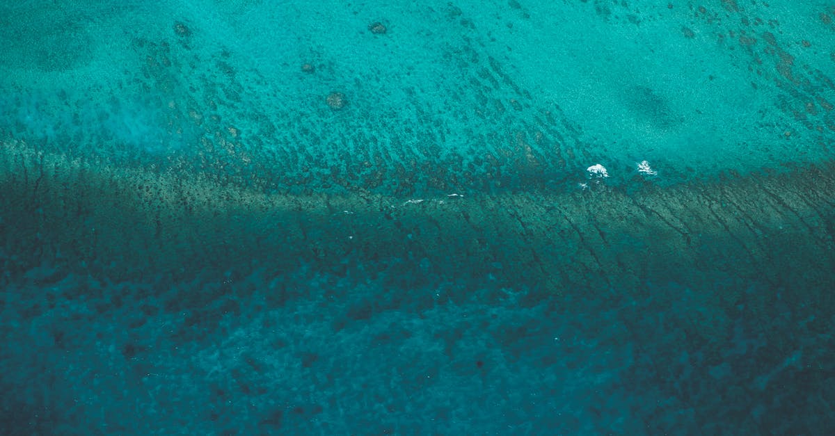 How do I escape from the bottom of the ocean? - Turquoise water in tropical resort How do I escape from the bottom of the ocean? - Turquoise water in tropical resort