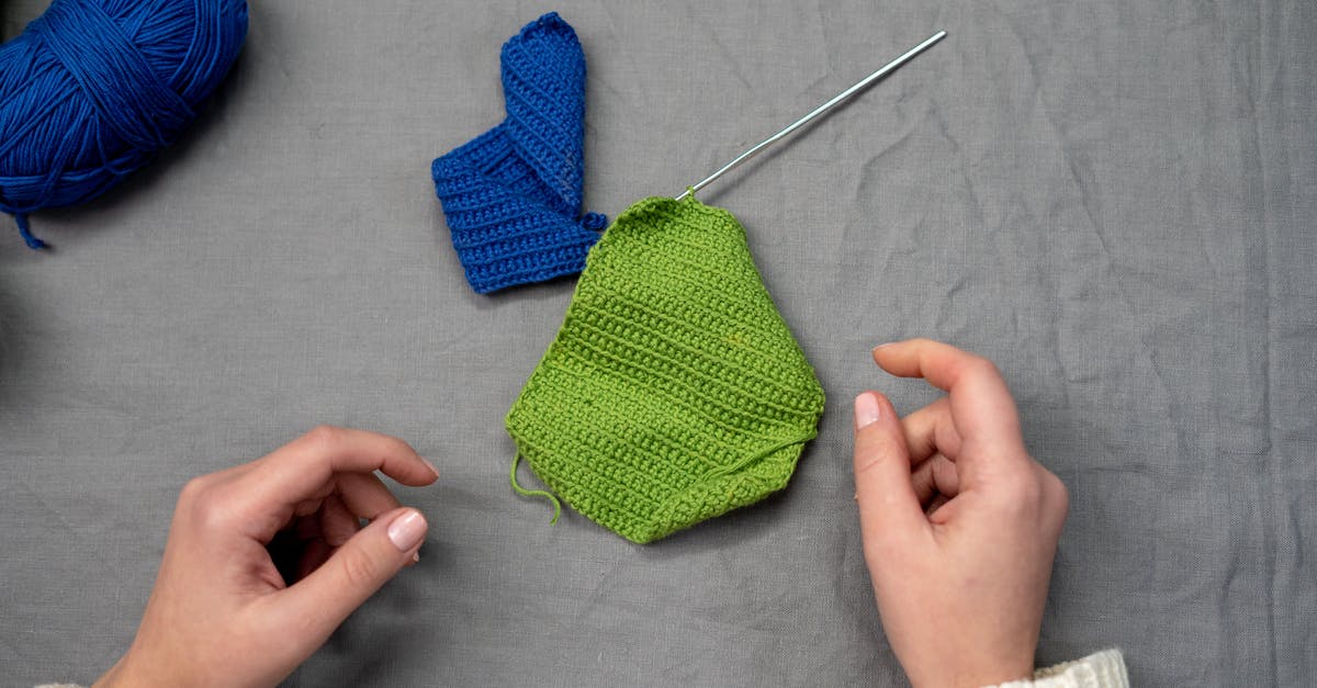 How do I establish peace between the Geth and the Quarians? - Green Knit Textile on Gray Textile How do I establish peace between the Geth and the Quarians? - Green Knit Textile on Gray Textile