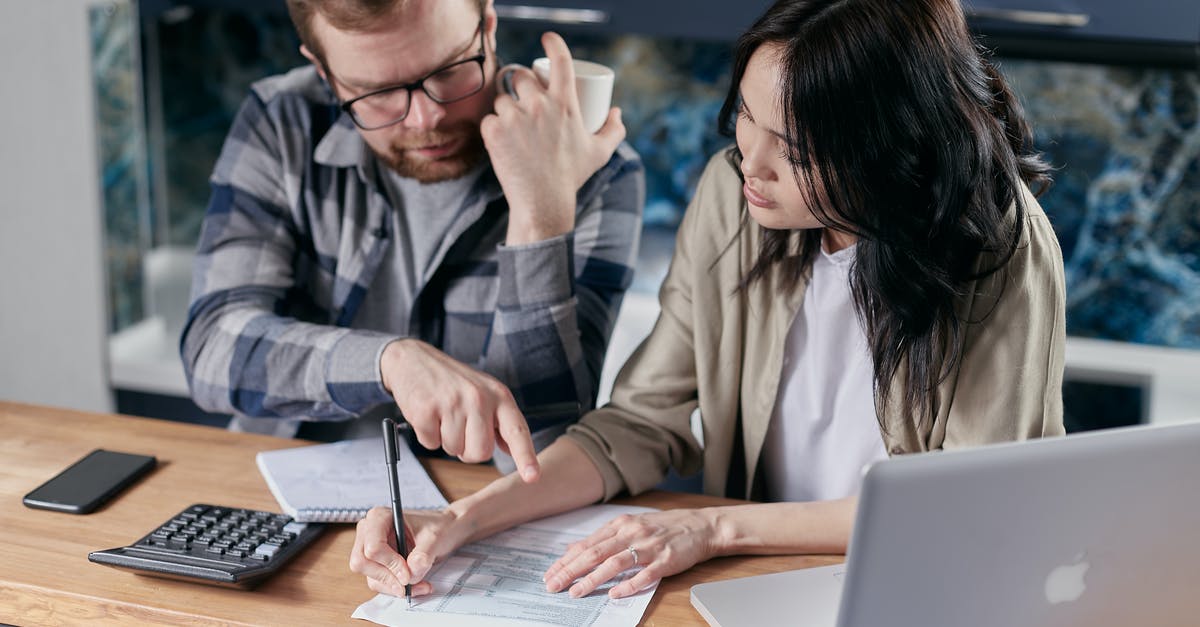 How do I estimate the requirements for my laundry? - Couple Calculating all their Bills