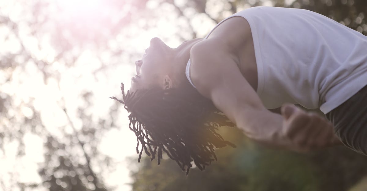 How do I evade and fall back from the Cloudburst Tank? - Ethnic man doing exercise in park How do I evade and fall back from the Cloudburst Tank? - Ethnic man doing exercise in park