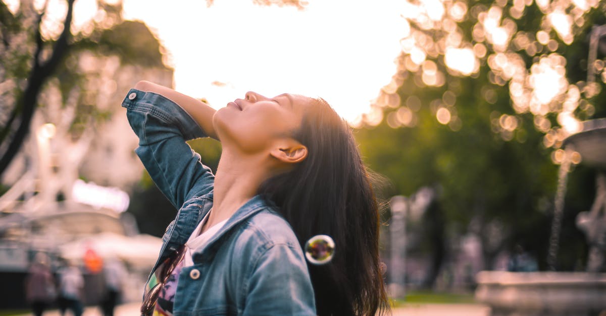 How do I evade and fall back from the Cloudburst Tank? - Carefree young woman enjoying life in city park How do I evade and fall back from the Cloudburst Tank? - Carefree young woman enjoying life in city park