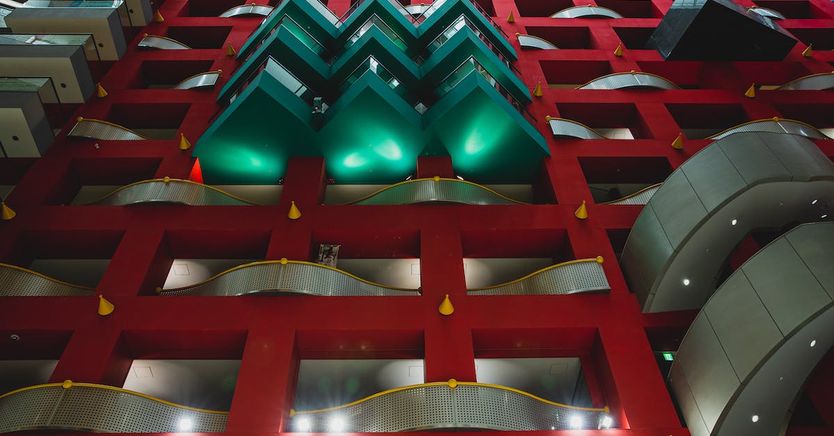 How do I evolve Kadabra to its final form without trading it? - From below of geometric shapes of contemporary building of business and trade center in Osaka