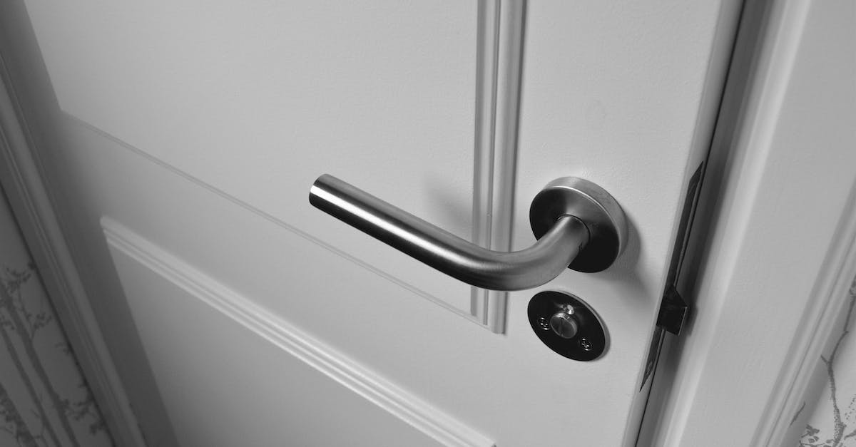 How do I exit through the beacon in Faster Than Light mobile? - Semi Open White Wooden Door