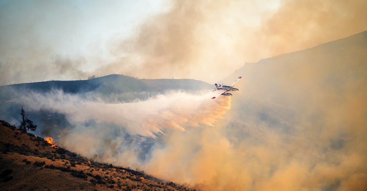 How do I extinguish a burning colonist? - Airplane flying over burning hilly terrain and spreading extinguishing powder How do I extinguish a burning colonist? - Airplane flying over burning hilly terrain and spreading extinguishing powder