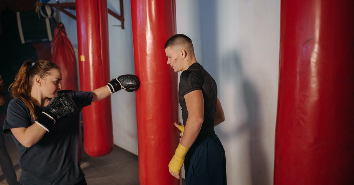 How do I fight a (wild) Pokemon with mine? - Woman Hitting the Red Punching Bag How do I fight a (wild) Pokemon with mine? - Woman Hitting the Red Punching Bag