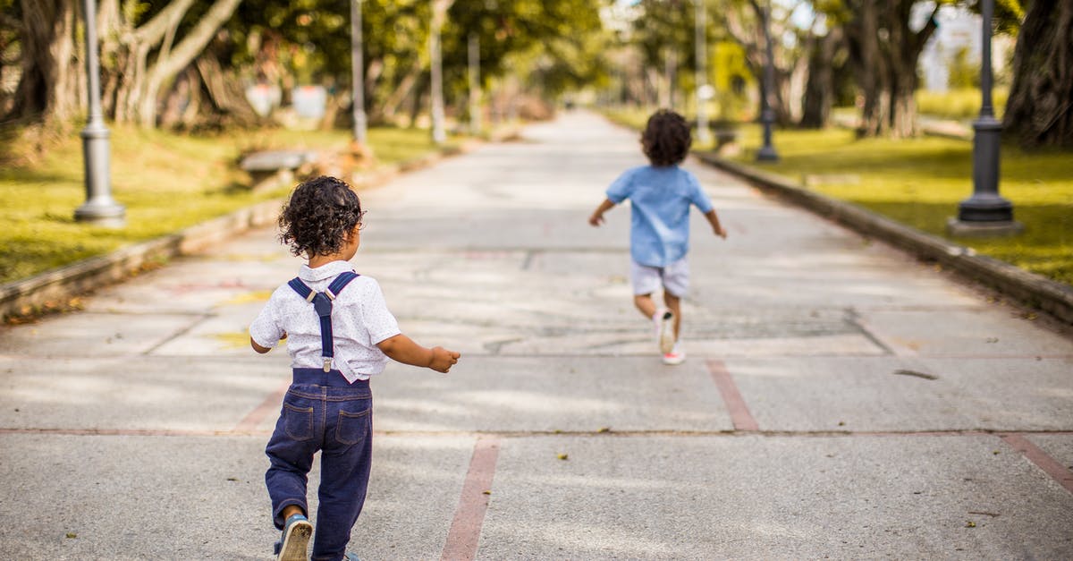 How do I find other players on little big planet? - Two Children Running on Road How do I find other players on little big planet? - Two Children Running on Road