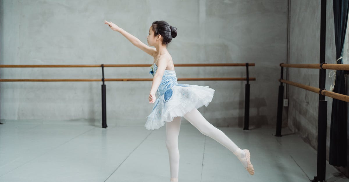 How do I forget a move learned by TM? Or are they permanent? - Side view full body of little ballerina practicing Arabesque position while training skills in dancing school