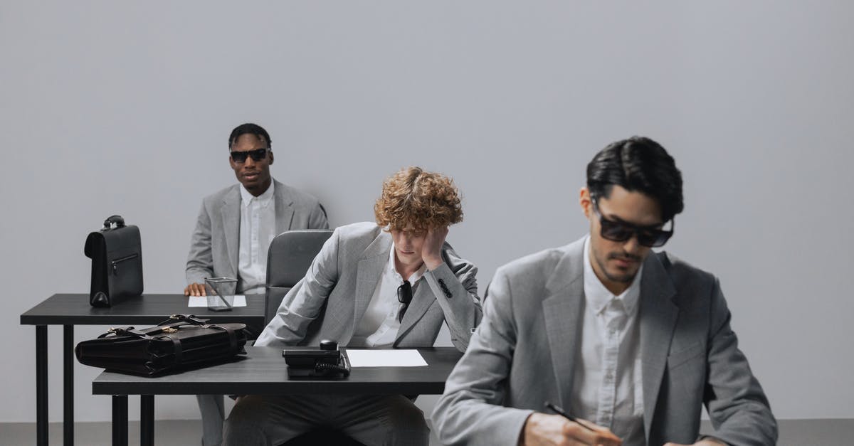 How do I get 2 desks in PewDiePie tuber simulators - Man in Gray Suit Jacket Standing Beside Man in Gray Suit