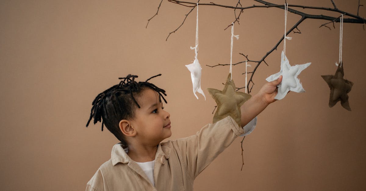 How do I get a five-star overall rating for a match? - Cute black boy touching soft handmade stars hanging on branch