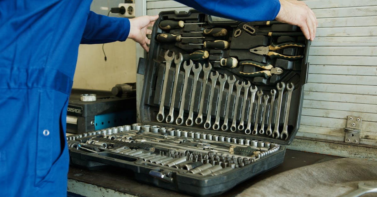 How do I get a five-star overall rating for a match? - A Person Holding a Set of Tools in a Toolbox
