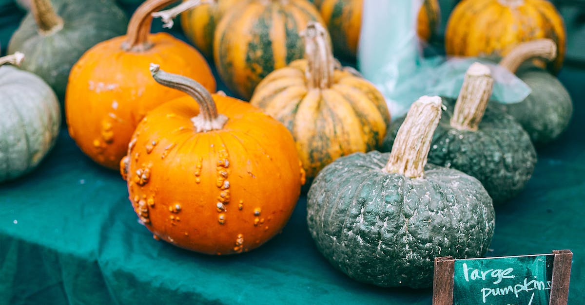 How do I get a green tag in clash of clans in the newest update of 2015 [duplicate] - Colorful raw pumpkins with pedicels on green cloth with price tag in local bazaar in daytime
