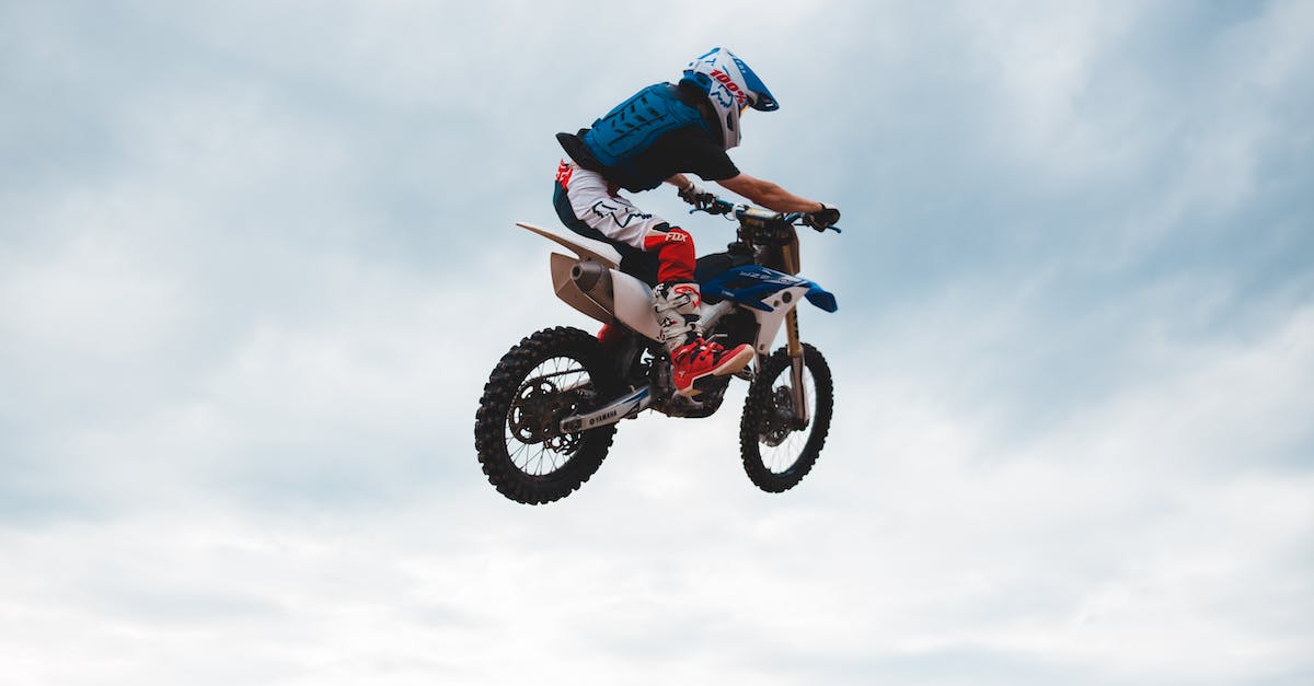 How do I get a lot of Stunt Driver points? - Unrecognizable man rider performing stunt in air