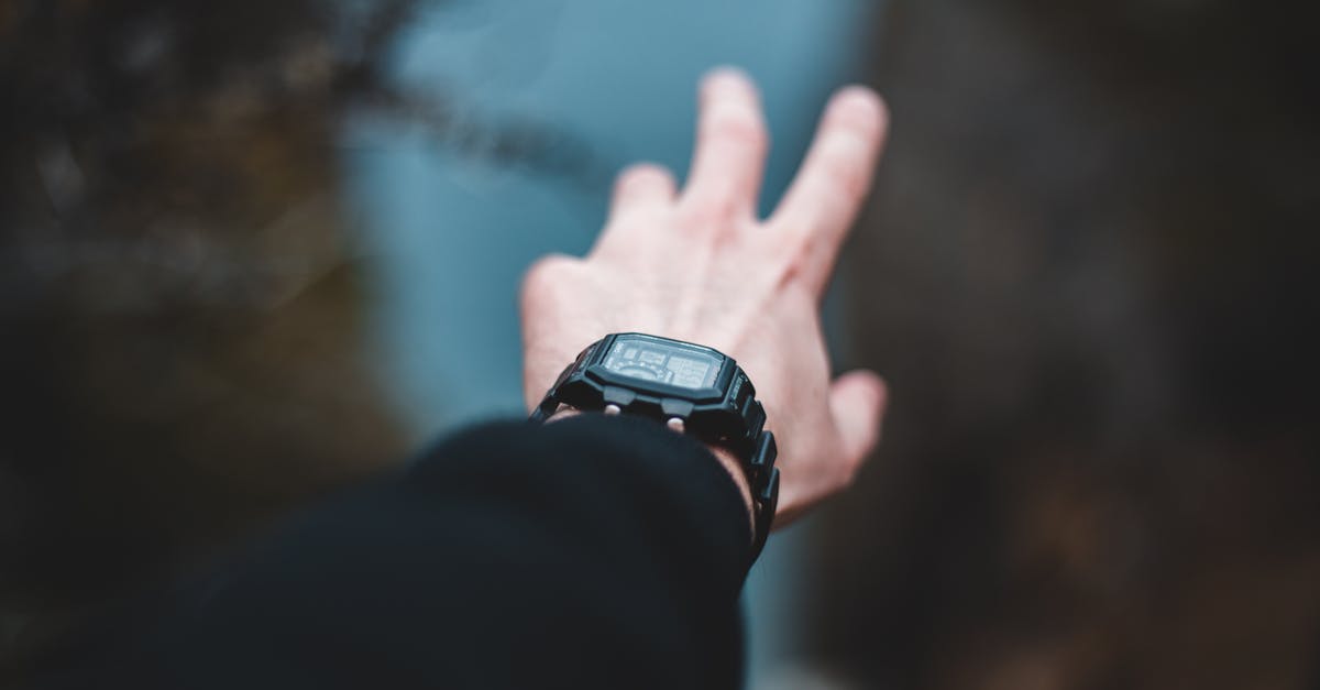 How do I get a rounder body? - Crop man outstretched hand reaching out for waterfall in nature How do I get a rounder body? - Crop man outstretched hand reaching out for waterfall in nature