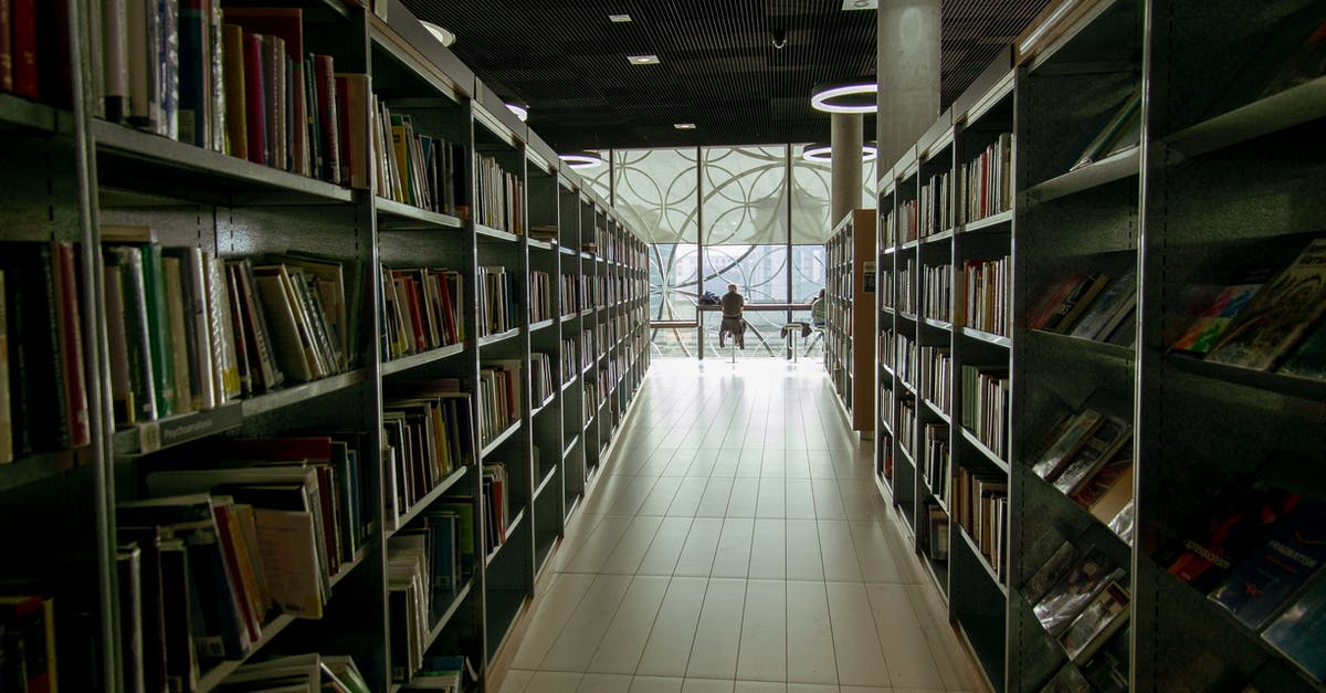 how do I get access to the single visitor set up (not visitor table)? - Interior of library with bookshelves