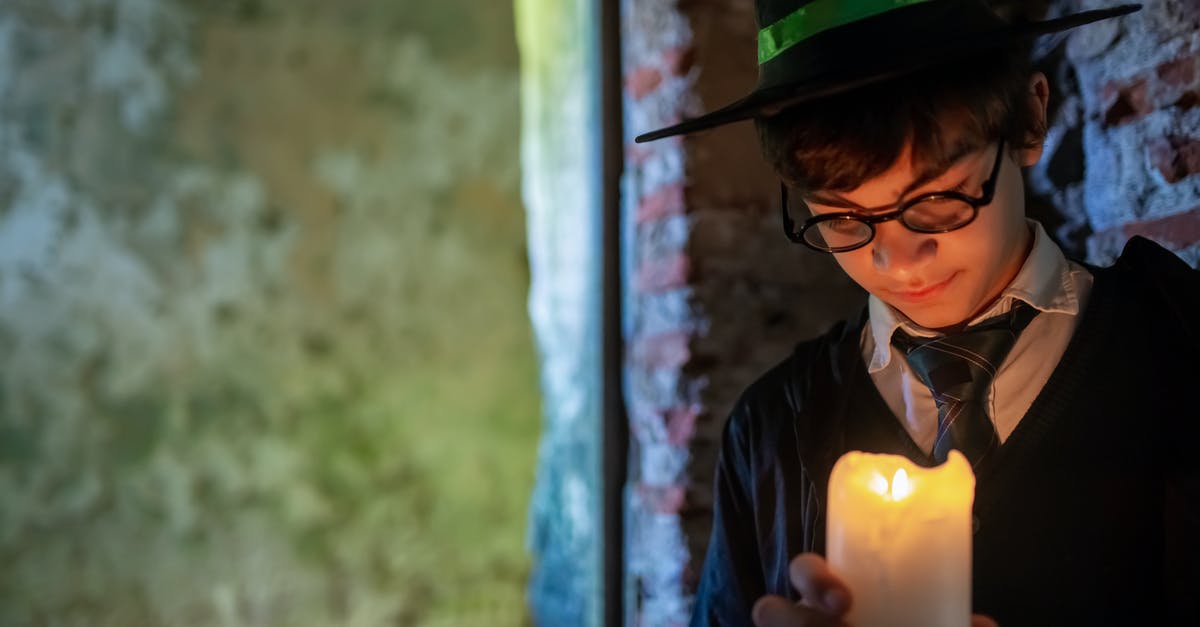 How do I get Dark Characters in Lego Harry Potter? [duplicate] - Woman in Blue Long Sleeve Shirt Holding Lighted Candle