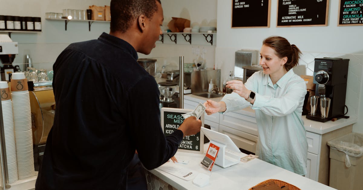 How do I get double cash mode? - A Woman Receiving Money from the Customer How do I get double cash mode? - A Woman Receiving Money from the Customer