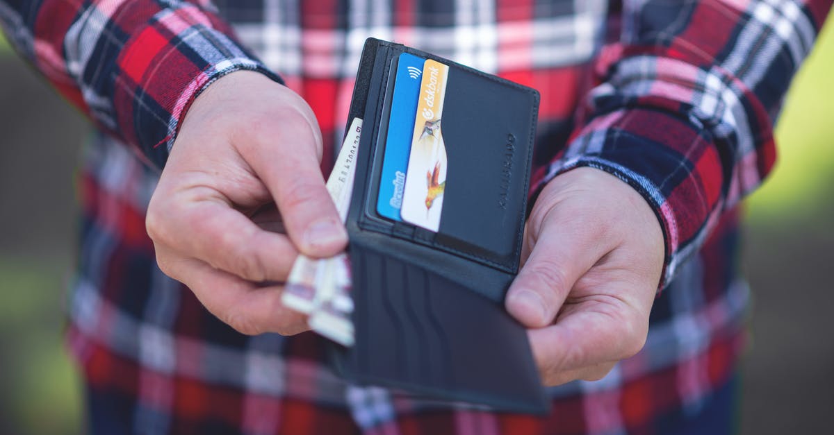 How do I get double cash mode? - Close-up Photo of Person getting Money out of the Wallet How do I get double cash mode? - Close-up Photo of Person getting Money out of the Wallet