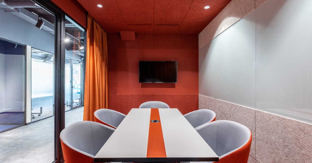 How do I get into the center room in the Iron Keep? - Modern workspace with TV and table