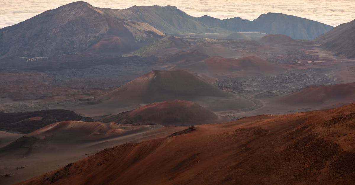How do I get last hits when laning against two ranged heroes? - Majestic view of mountain valley located near waving foamy sea against cloudy sky