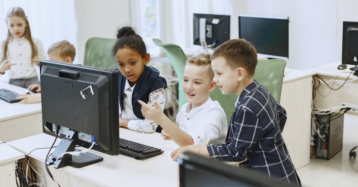 How do I get more mech tech points? - Children Taking IT Classes Looking at a Computer Screen